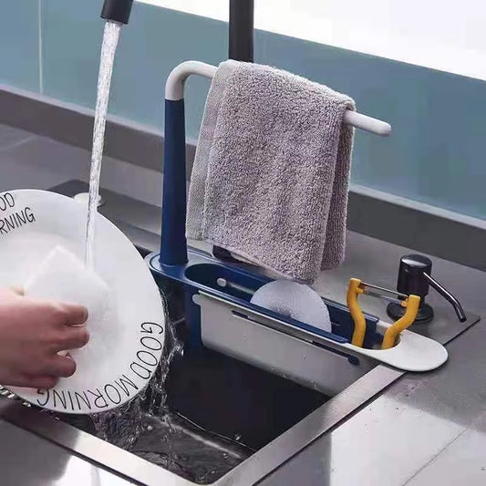 Adjustable sink storage device