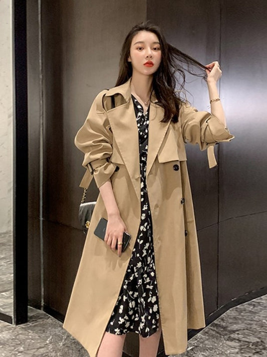 An elegant trench coat for women for winter, pleasant to the touch for work or evening